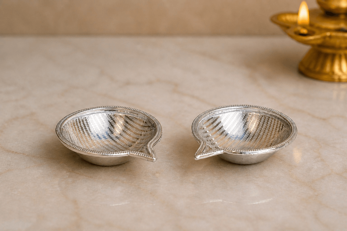 PAIR OF SILVER DIYAS